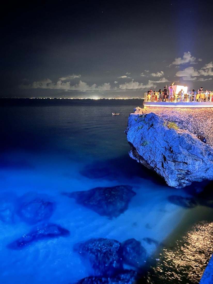 Blue coastal landscape and bar after dark